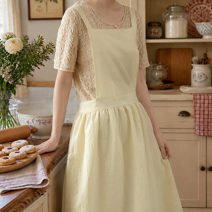 Casual apron dress with adjustable straps, gathered waist and side pockets Kalsten