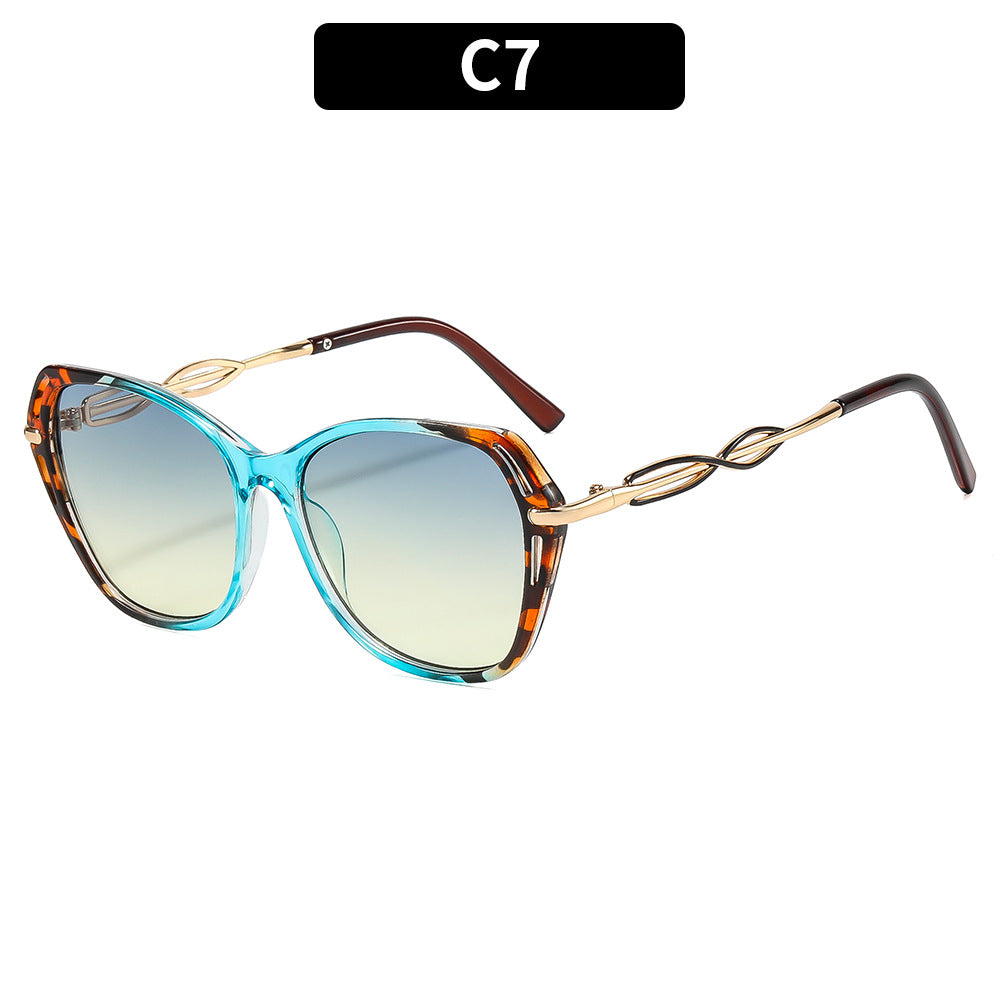 Stylish Cat-Eye Sunglasses with Elegant Gold Accents