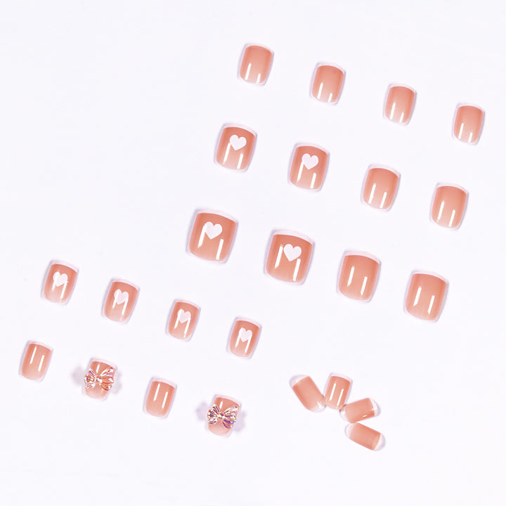 Nail art with heart and butterfly motifs Kalsten