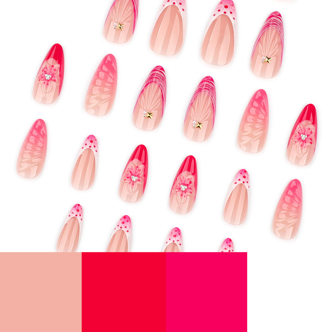 Artful stiletto nails with floral design and glitter accents Kalsten