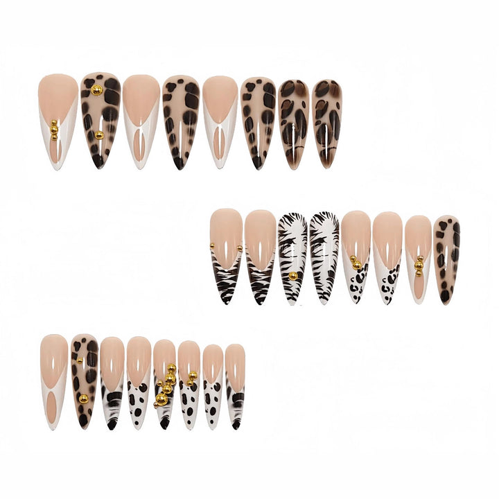 Stiletto fake nails with animal pattern and gold accents Kalsten