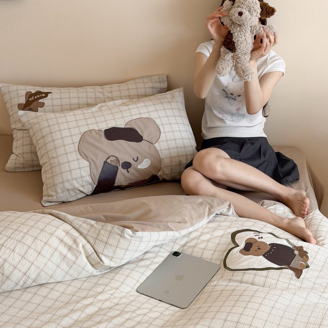 Cozy bed linen set made of cotton percale with fine check and panda appliqués
