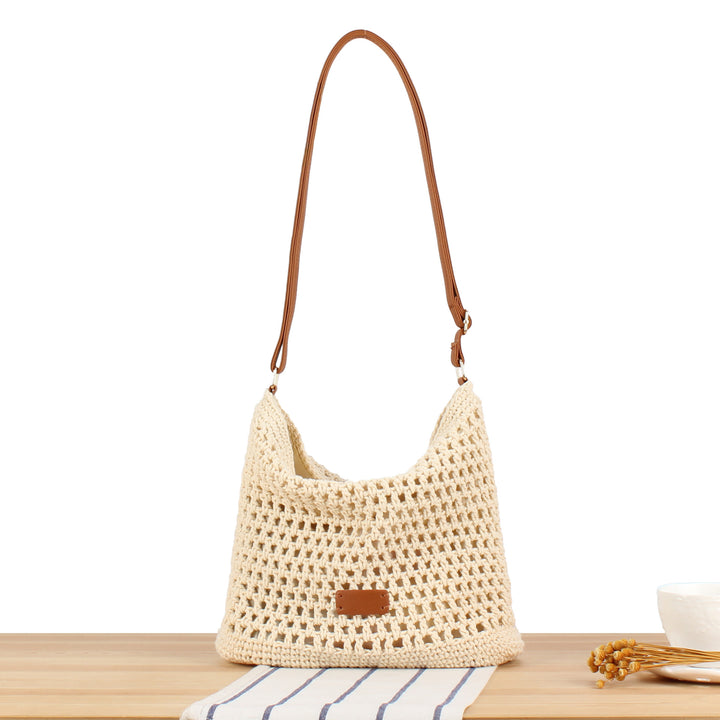 Handbag made of hand-knotted natural material with leather accents Kalsten