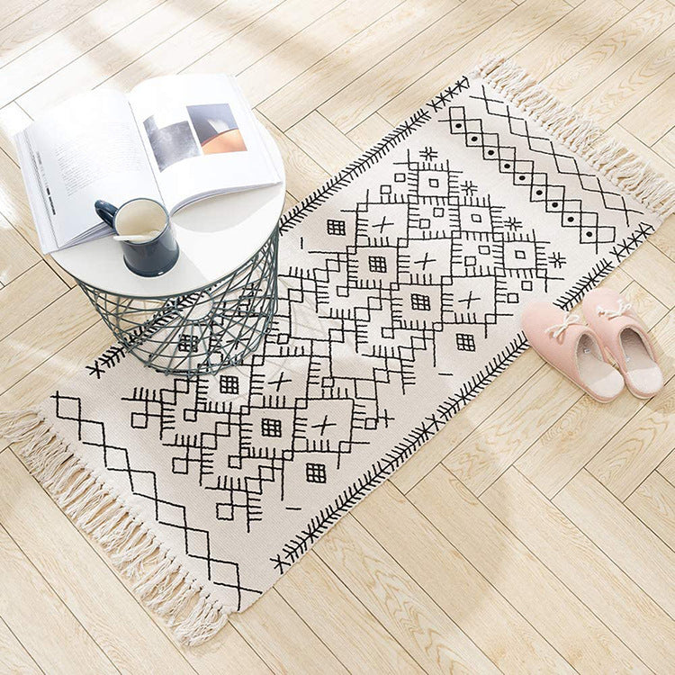 Flat-woven entrance and living room rug with Moroccan diamond jacquard and decorative fringes Kalsten