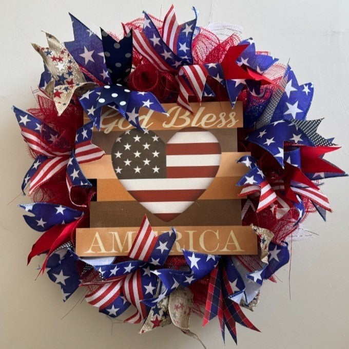 Unisex nan layered star wreath door decor with mixed ribbon bows and wooden accents Kalsten