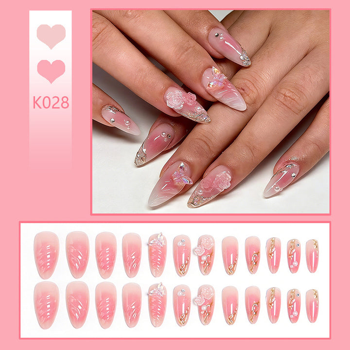 Artificial nail creation with floral 3D details and glitter accents Kalsten