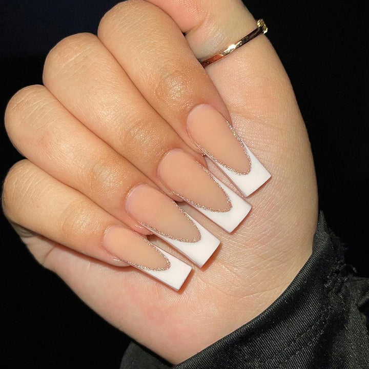 Lacquered stiletto nails with glitter decoration Kalsten