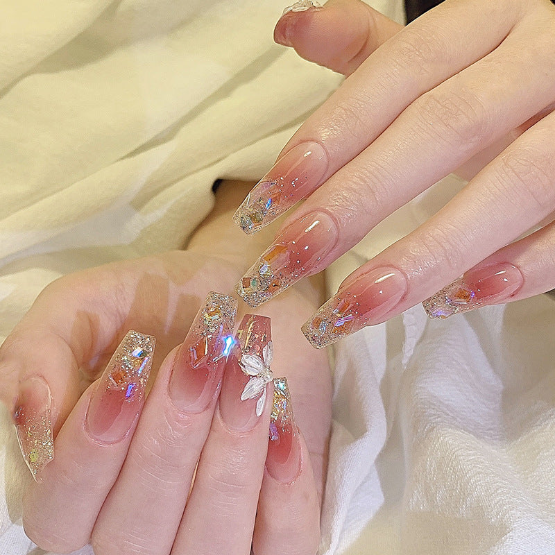 Artificial nail set with floral and glittering accents Kalsten
