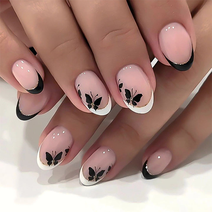 Elegantly designed nail art with butterfly motif Kalsten