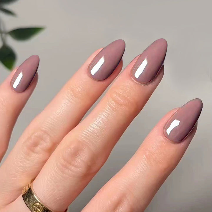 Artistic stiletto nails with elegant high-gloss finish Kalsten