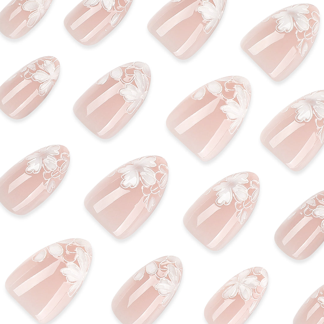 Artistic stiletto nails with floral embellishments Kalsten