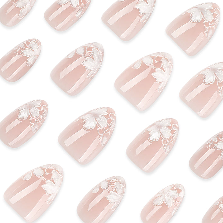 Artistic stiletto nails with floral embellishments Kalsten