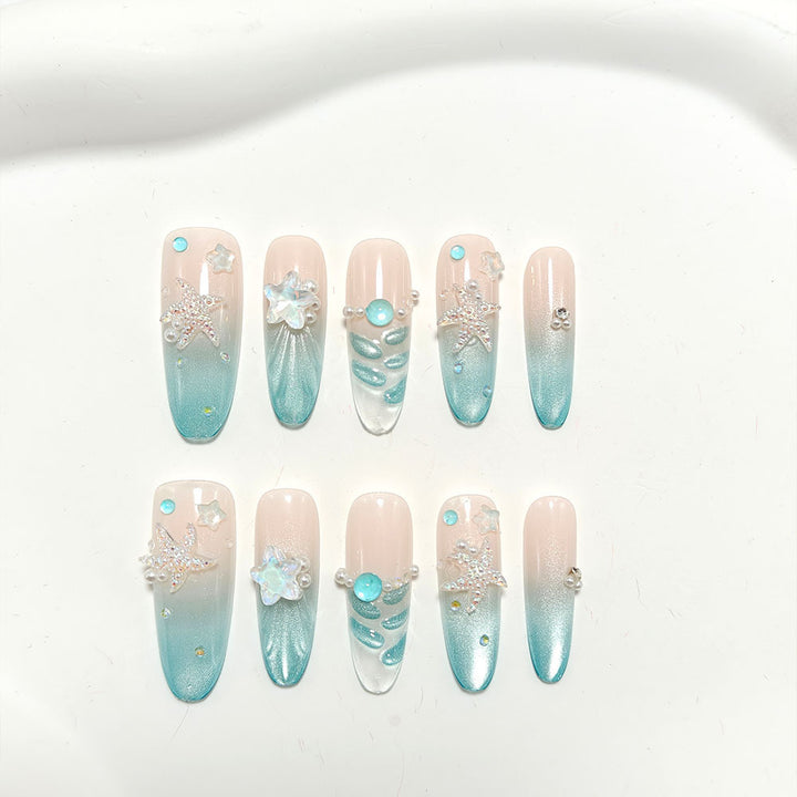 Elegant Nail Art with Ocean Theme and 3D Accents Kalsten