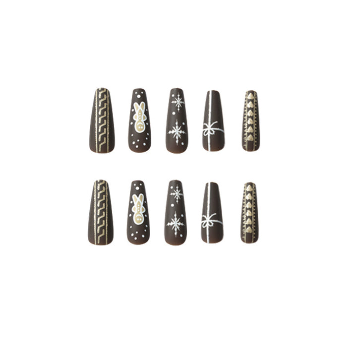 Artificial nail art with festive gingerbread design Kalsten