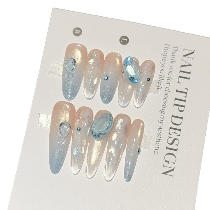 Artificial nails with rhinestones and glitter effects Kalsten