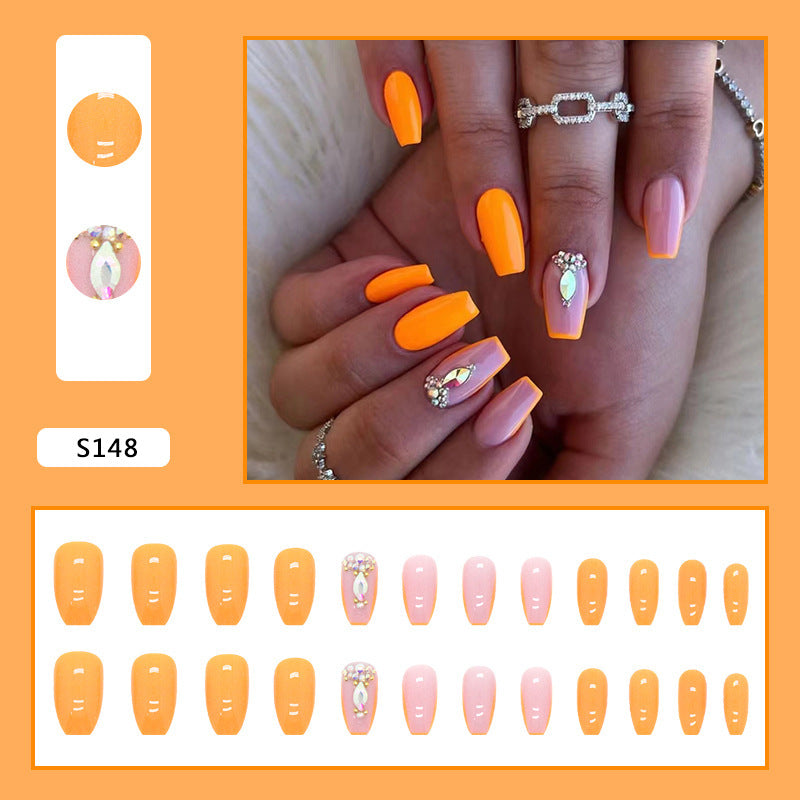 Acrylic nail set with trendy neon colors and rhinestone accents Kalsten