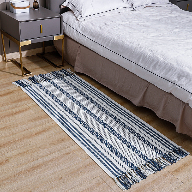 Flat-woven cotton runner with fringes and graphic ethnic stripe pattern Kalsten