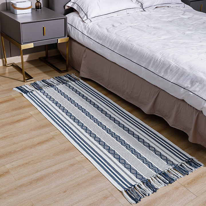 Flat-woven cotton runner with fringes and graphic ethnic stripe pattern Kalsten