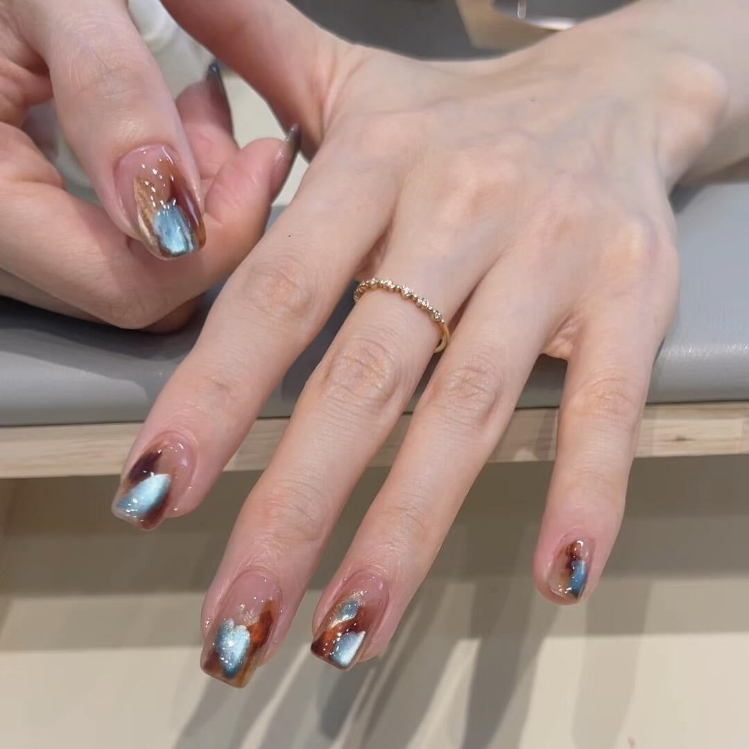Colorful Art Nails In Modern Marbled Design Kalsten