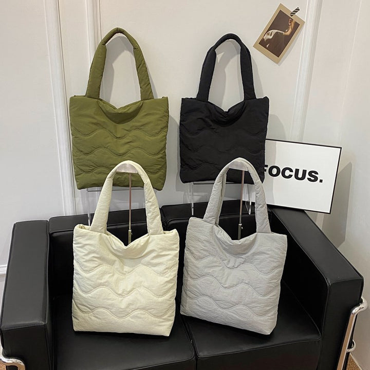 Padded shoulder bag with wave design Kalsten