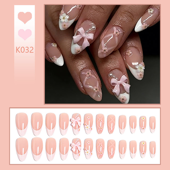 Artful Nail Tips with Ribbons and Floral Decorations Kalsten