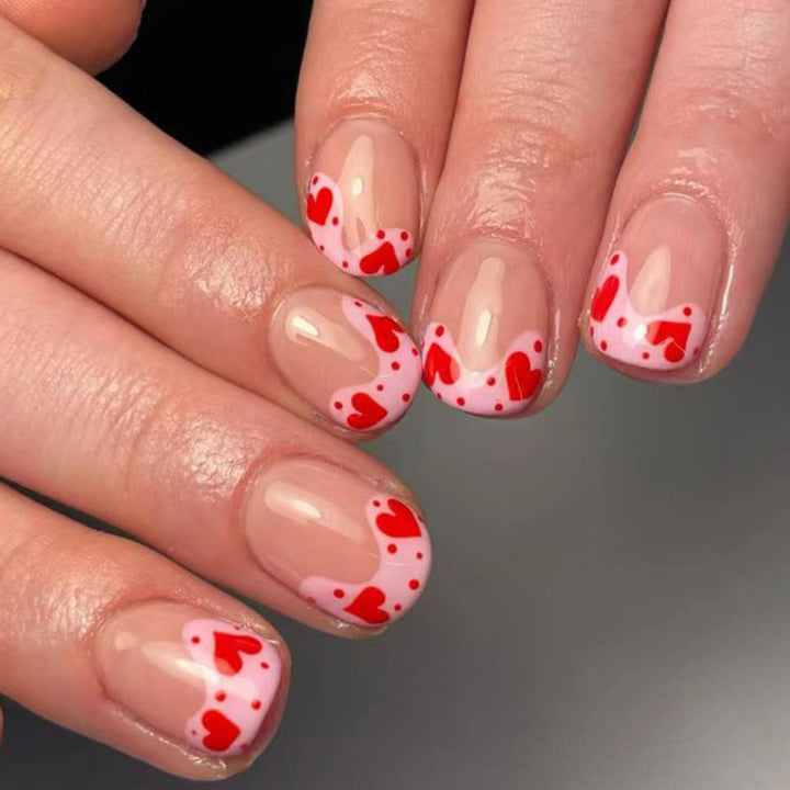 Artfully designed nail tips with heart motifs Kalsten