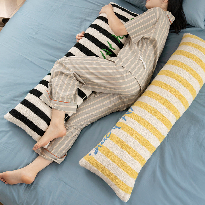 Elongated bench and windowsill cushion with nautical stripe texture and embroidered lettering Kalsten
