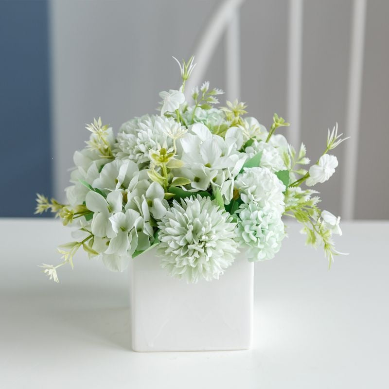 Lifelike Floral Arrangement in Decorative Square Planter
