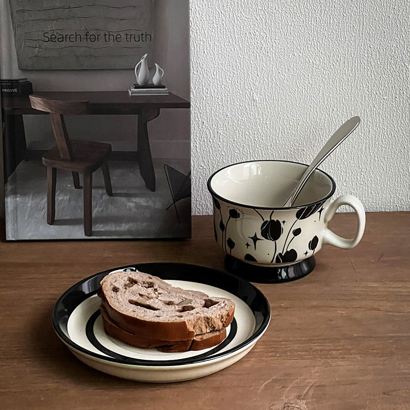 Ceramic coffee cup set with saucer and hand-painted leaf ornament