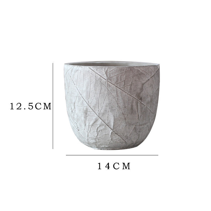 Decorative plant container made of handmade ceramic with leaf pattern Kalsten