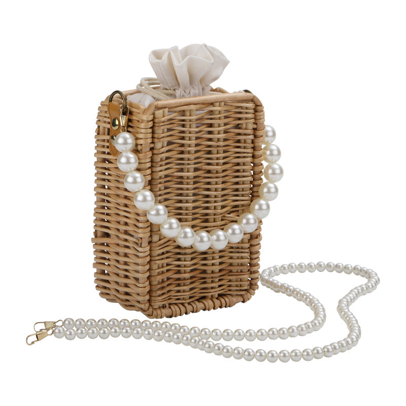 Women's handbag made of woven material with pearl accents Kalsten