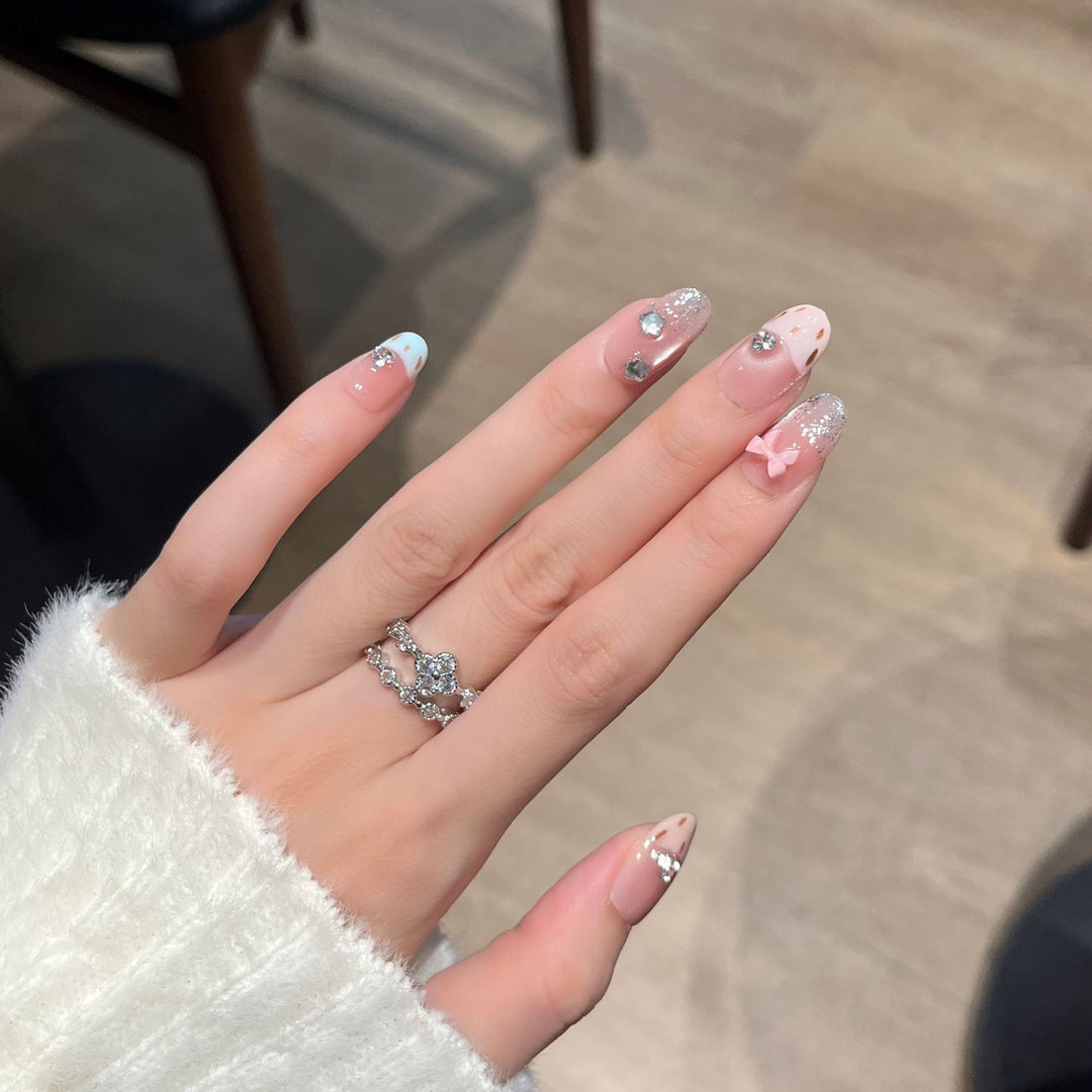 Decorative Press-On Nail Art with Bow and Gem Accents Kalsten