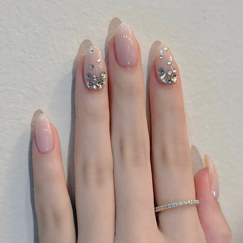 Artful nail art with delicate glitter accents and elegant French tip Kalsten
