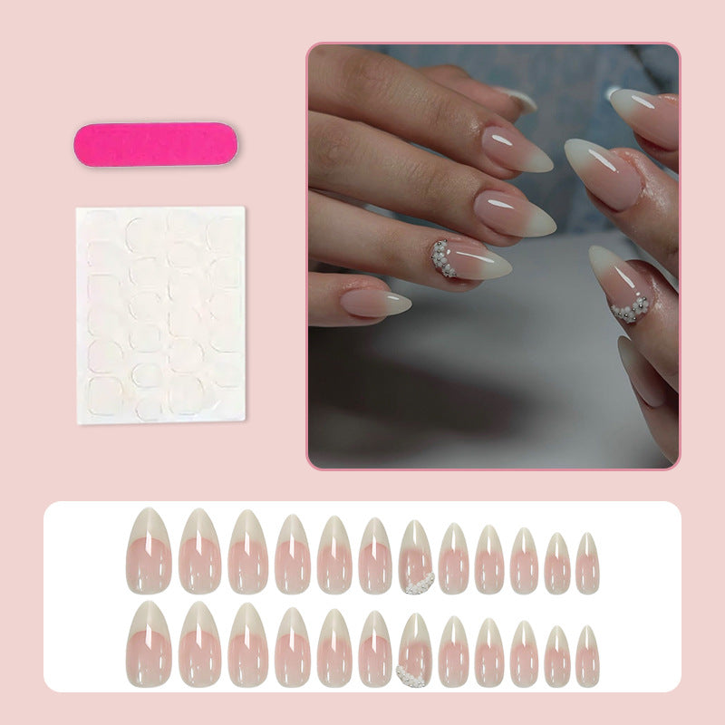 Acrylic nail set with elegant French tip and extravagant decorative details Kalsten