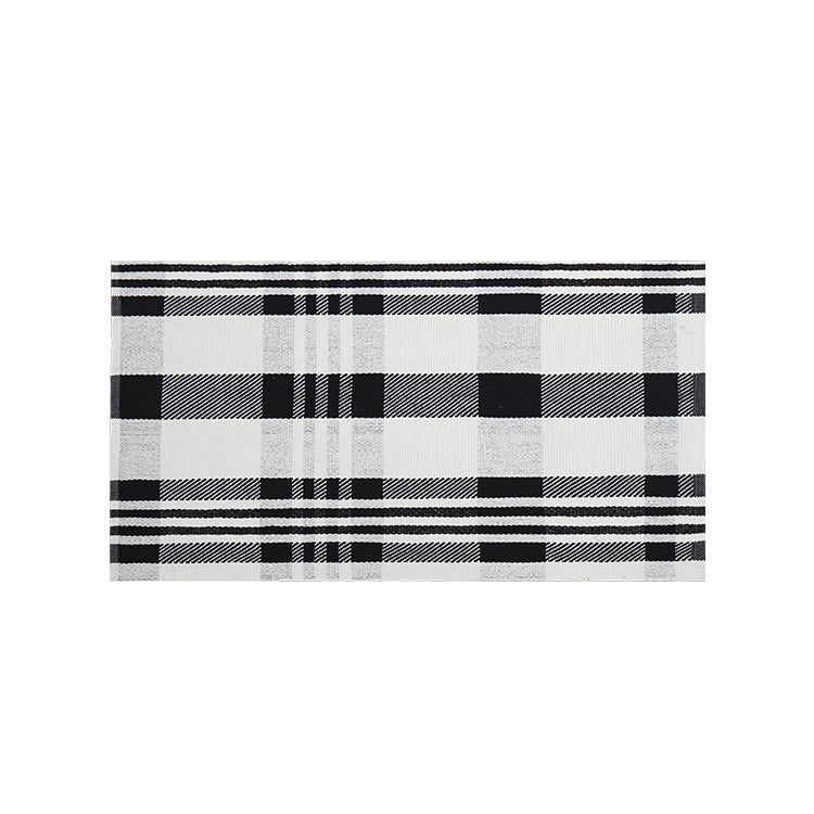 Woven cotton blend bath mat in buffalo check with flat weave structure Kalsten