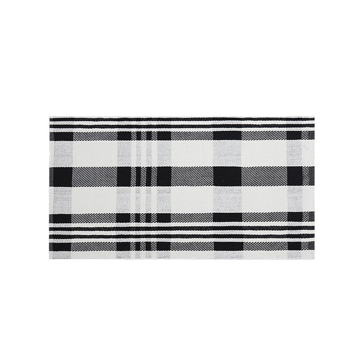 Woven cotton blend bath mat in buffalo check with flat weave structure Kalsten