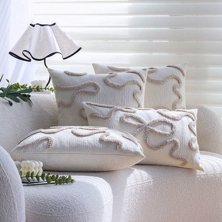 Square decorative cushion cover with hand-tufted bow and wave relief made of cotton-linen mix Kalsten