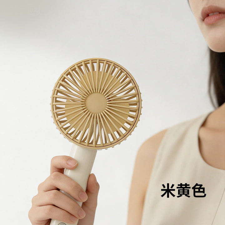 Women's portable handheld fan with ergonomic grip and powerful battery technology Kalsten