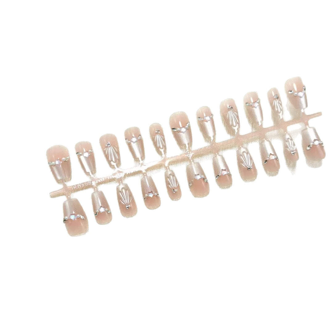 Glamorous artificial nails with filigree 3D decorations Kalsten