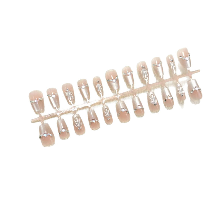 Glamorous artificial nails with filigree 3D decorations Kalsten