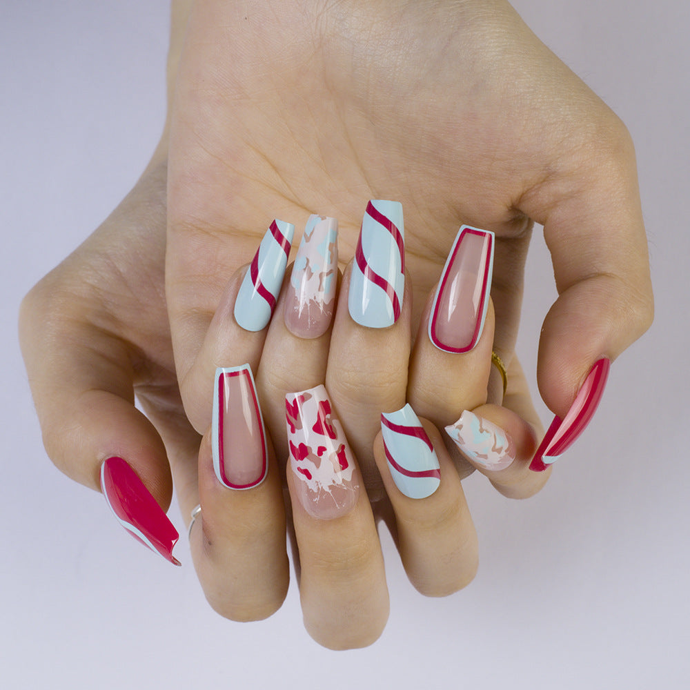 Artificial nails with modern wave pattern and heart accents Kalsten