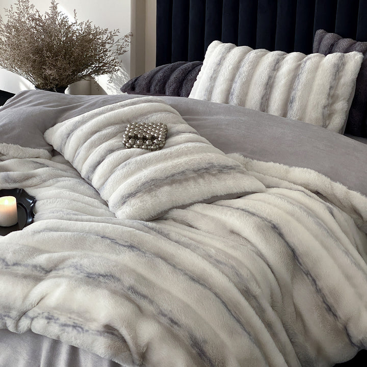 Luxury faux fur throw and cushion set with striped texture