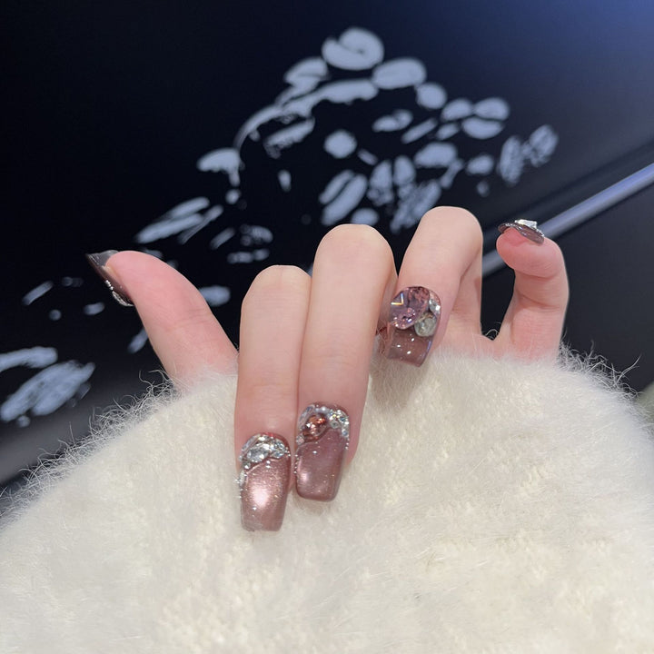 Decorative Press-On Nail Design with Gemstone Accents Kalsten