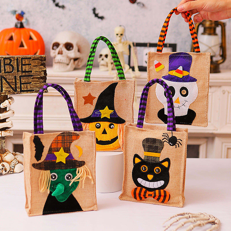 Halloween-Jute bag with stitched black cat and striped carrying handles
