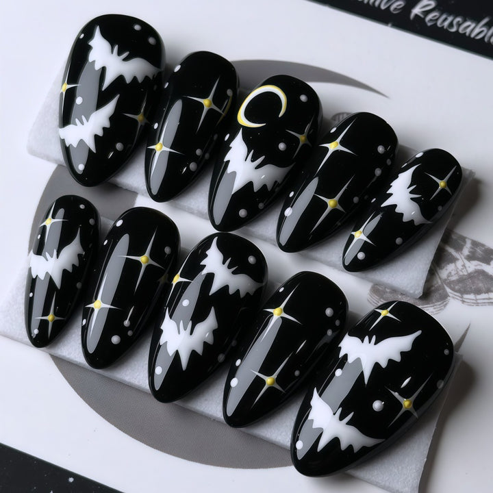 Artificial nails in creative Halloween bat design Kalsten