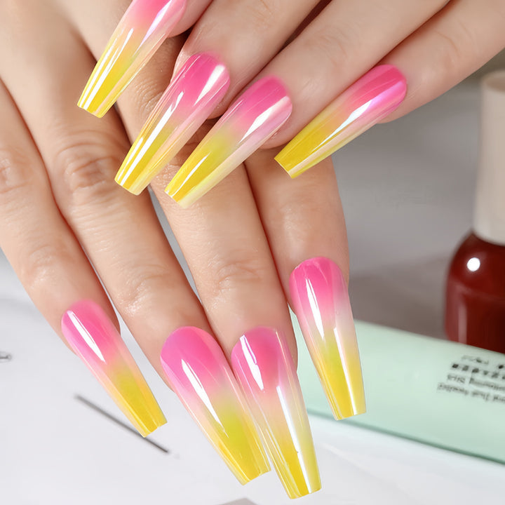 Artificial nail tips in modern ombre design Kalsten