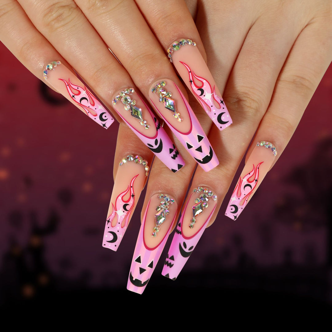 Artificial nail art with festive design and glitter variations Kalsten