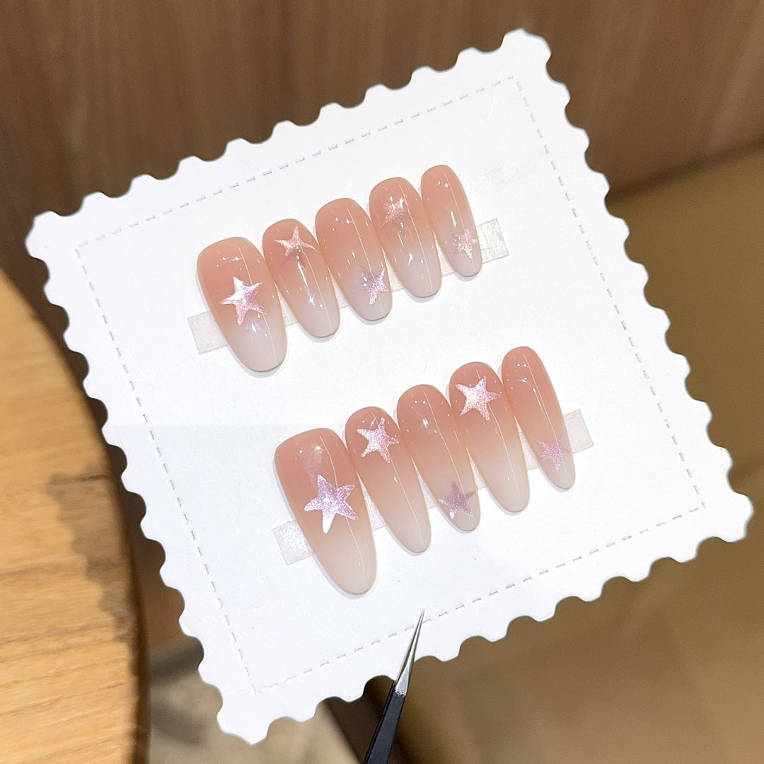 Artificial nails with sparkling stars and gentle gradient Kalsten