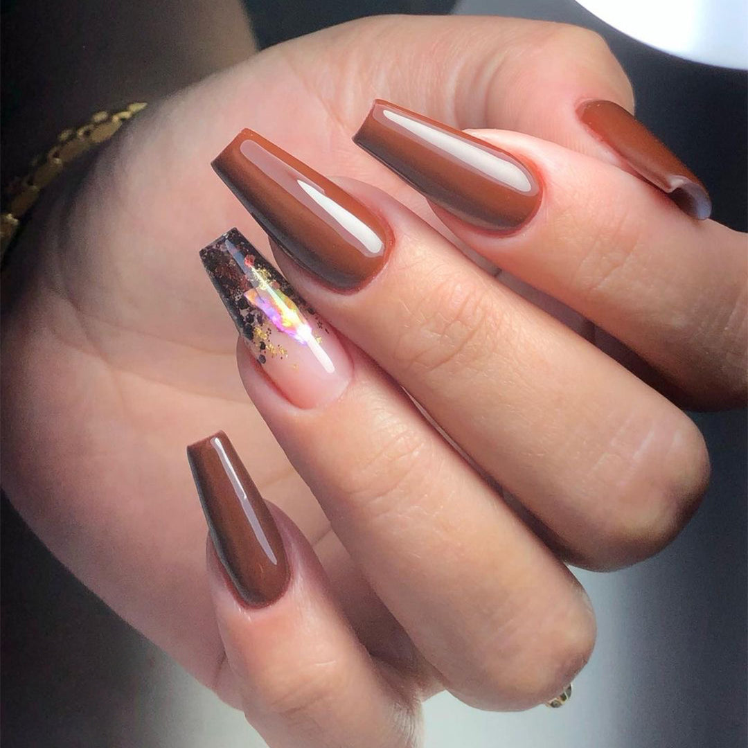Artificial acrylic nails with elegant glitter accents and creative designs Kalsten