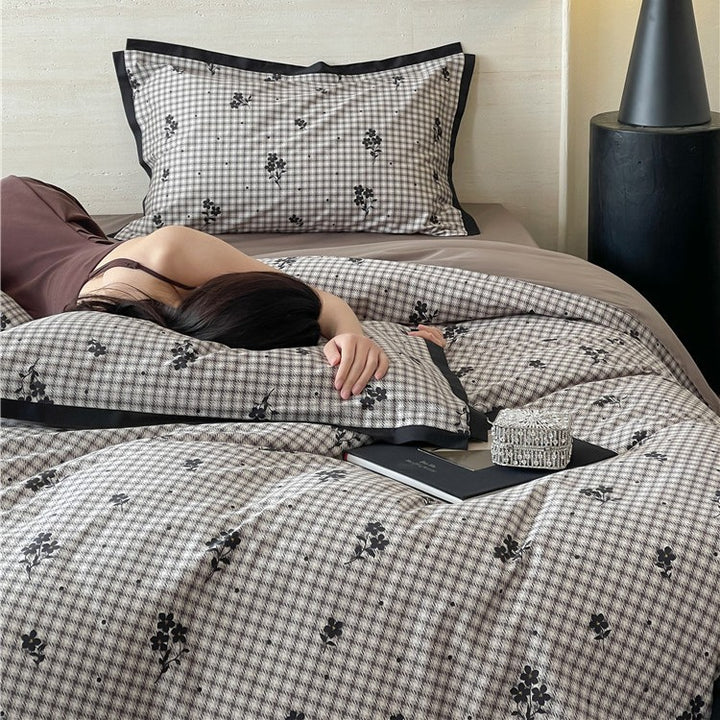 Luxurious cotton satin bedding set with butterfly motif and contrasting frame edge